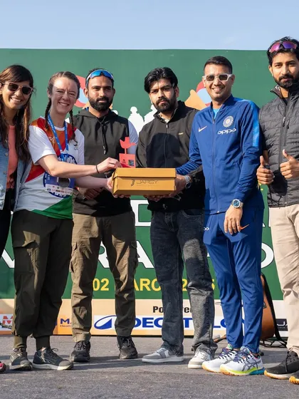 A group photo with the winners and organizers at the Chandigarh Marathon. Collaboration with other organizers and sponsors is key to a successful event.