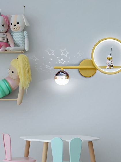 Here is the astronaut wall light in a child's playroom. It's a fun and functional piece that adds personality to the space.