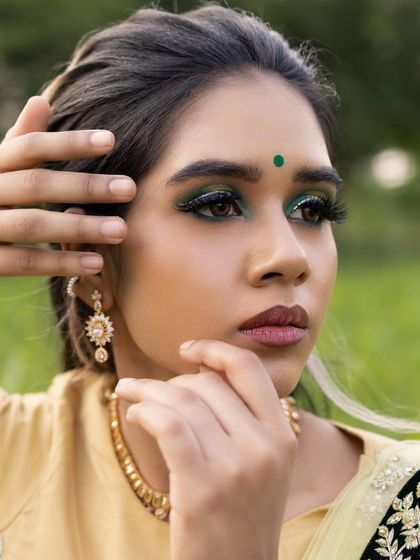 This look was taught during a professional makeup class. It demonstrates how to create a bold, colorful eye that is blended perfectly and ready for the camera.