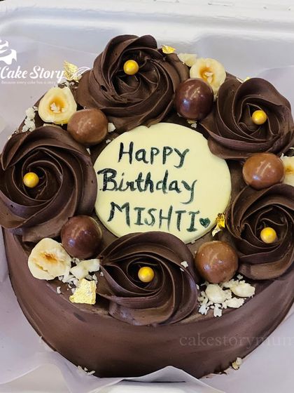 Another look at the chocolate hazelnut bento cake for Mishti. You can see the detail in the chocolate work and the delicate placement of the toppings.