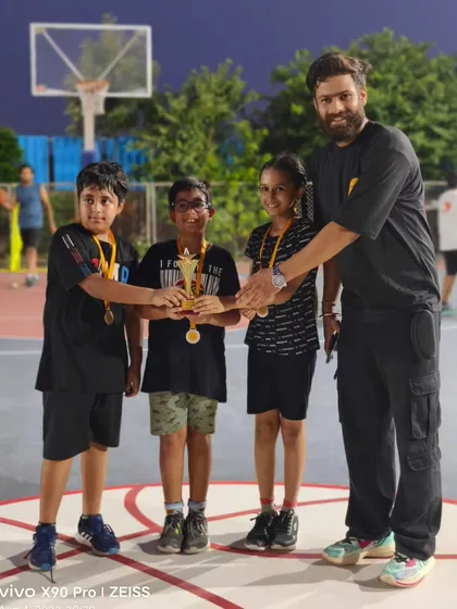 The U-10 FireBall runners-up team receiving their trophy. Even in defeat, they showed the heart of a champion, and that deserves to be celebrated.