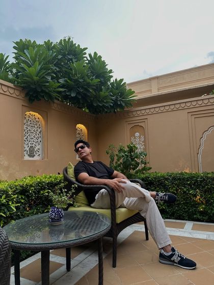 Relaxing in a quiet courtyard in Jaipur before a big event. Taking a moment to chill and get centered is key to delivering a high-energy performance.