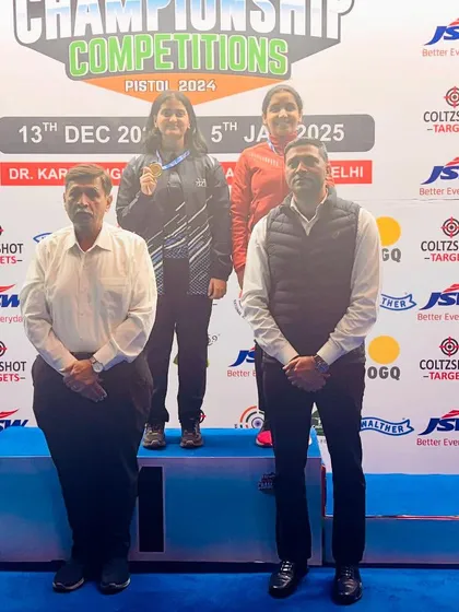 A student on the winners' podium at the National Shooting Championship. We prepare our athletes to not just compete, but to win and stand on the podium.