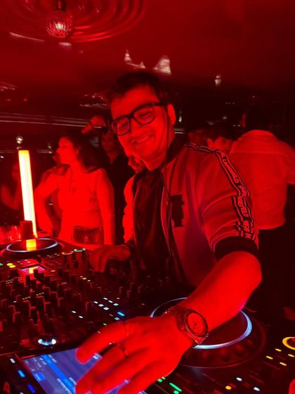 Another shot from a red-lit, high-vibe night. I'm always smiling when I'm playing for a great crowd.