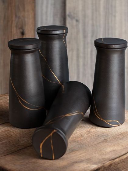 Another view of the custom carafes, showing their elegant, modern form. I enjoy the challenge of production pottery, creating consistent, high-quality pieces in large quantities.