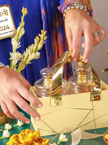 Our customizable Diwali hampers are perfect for corporate or personal gifting. Here, you can see one of our elegant jar caddies being prepared.