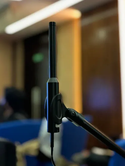 A close-up of the MiniDSP UMIK-1, a calibrated measurement microphone that is central to our training. We ensure all participants get practical experience with the precise tools required for professional room acoustic analysis.