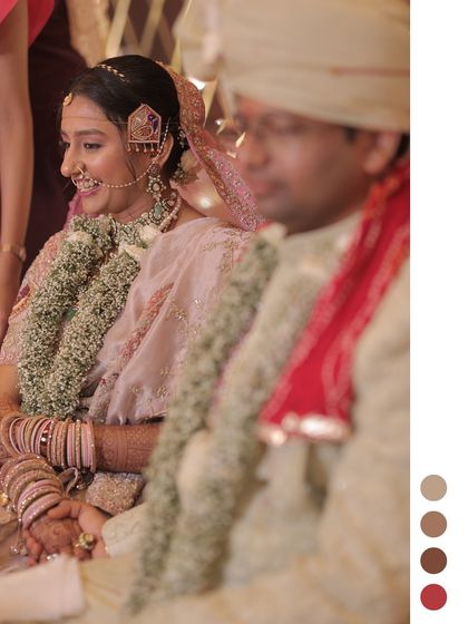 A quiet, candid moment shared between the bride and groom during their pheras. It's these subtle, emotional exchanges that I aim to create space for, ensuring the wedding feels as personal as it is beautiful.