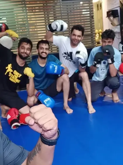 Sweat, grit, and glory. A selfie with the squad after a grueling Muay Thai session.