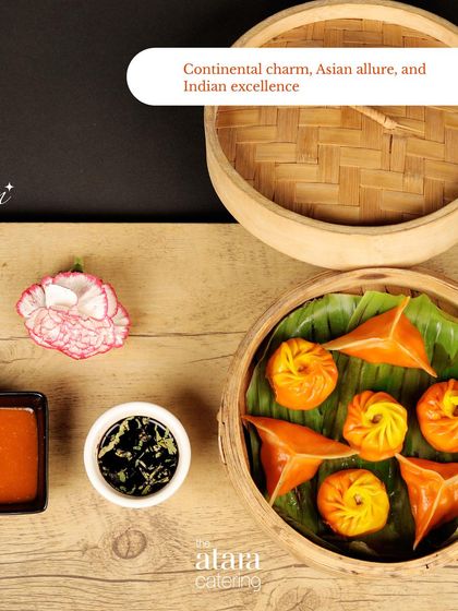 A colourful assortment of Asian dim sums served in a bamboo steamer. This dish represents the artistry and authentic flavours of our Pan-Asian cuisine.