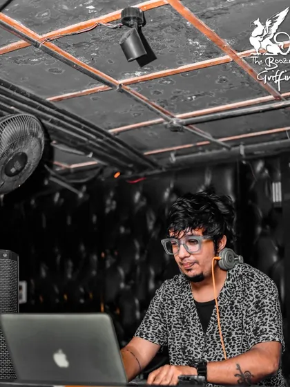 A candid moment of me mixing tracks during a Bollywood night at The Boozy Griffin. My job is to blend the best hits to keep the party going.