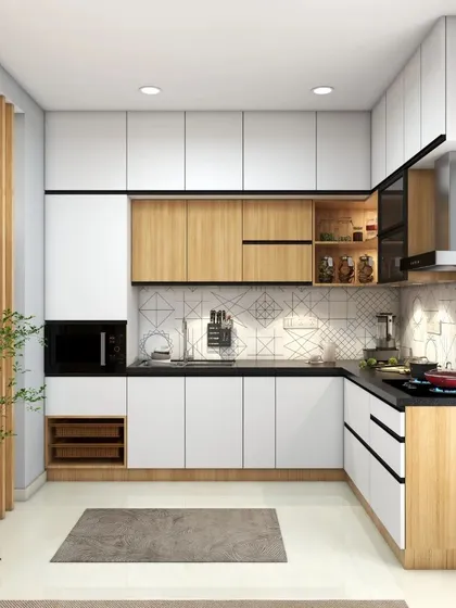 Our modular kitchens are the heart of the home, designed for both functionality and style. This L-shaped kitchen design combines natural wood tones with clean white cabinetry, offering ample storage and a practical layout for everyday cooking and family gatherings.