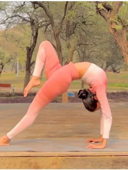 This is Eka Pada Urdhva Dhanurasana, or One-Legged Wheel Pose. Lifting one leg in the wheel pose adds a significant challenge to your balance and increases the stretch on the standing leg's hip flexor.