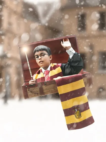 The magic continues with this Harry Potter themed shot, where the young wizard appears to be flying in a chest through a snowy scene, wand at the ready.
