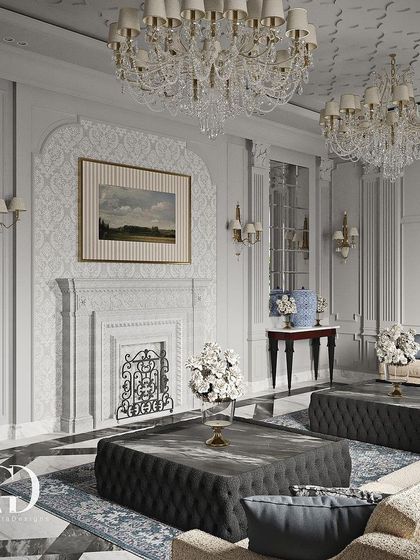 A detailed shot of the fireplace and surrounding wall treatment. The intricate, low-relief plasterwork adds a subtle layer of texture and historical reference, elevating the entire room.