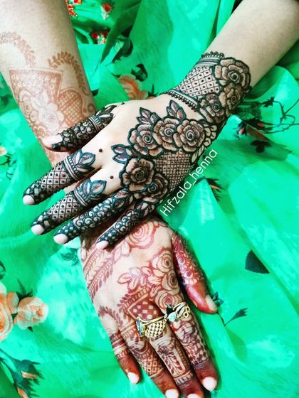 A beautiful photo showing both a fresh henna application and a mature stain. The contrast is stunning.
