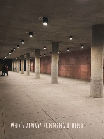 A wider view of the underpass, showing me still working to get the shot. The text overlay continues the story of a photographer's dedication.