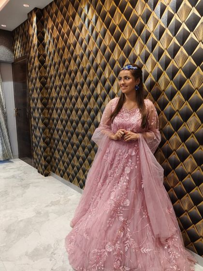 A candid shot of the client in the pink gown.