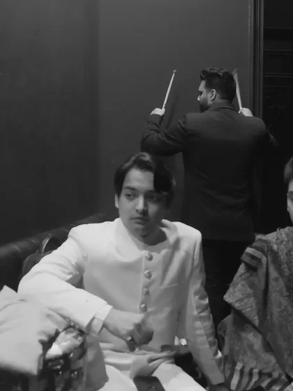 Backstage moments with the band. The energy and camaraderie we share off-stage translate directly into the chemistry you see during our live performances.