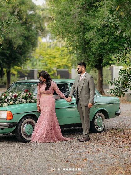 Ameera and Richard with their vintage car, a perfect prop for a stylish and romantic shoot. I often work with couples to incorporate personal elements into their films.