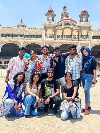 The group posing in front of the magnificent Mysore Palace. A must-see landmark and a highlight of our city tour.