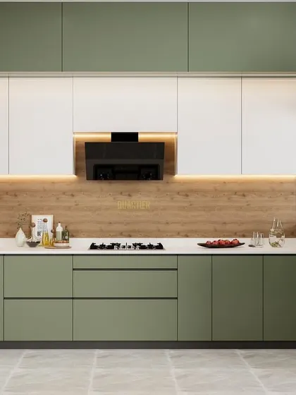 A wide view of the pastel green modular kitchen render. The L-shaped layout provides ample counter space, and the combination of green lower cabinets and white upper cabinets creates a light and airy feel.