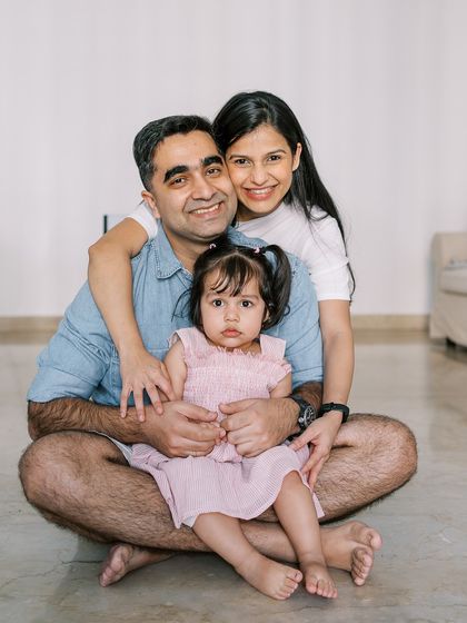 A classic family hug on the floor. The love and connection are what shine through in this simple, beautiful portrait.