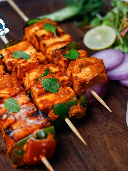 A timeless classic, my Traditional Paneer Tikka is always a crowd-pleaser. Marinated in yogurt and spices, then grilled to perfection with peppers and onions, it's a must-have for any Indian food menu.