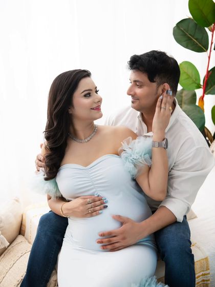 A candid moment of interaction. The playful and loving glance between them makes this portrait feel authentic and full of personality.