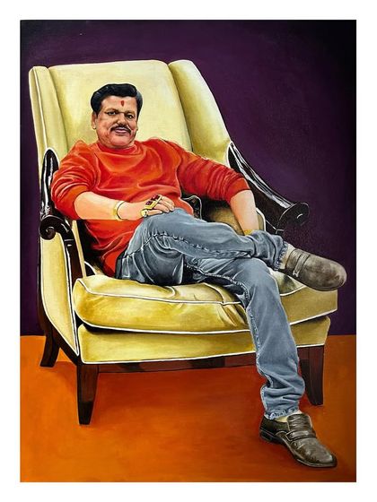 A full view of a commissioned acrylic portrait of a man seated in an armchair. This painting shows how I can create a complete scene from a photograph, turning it into a formal piece of art.
