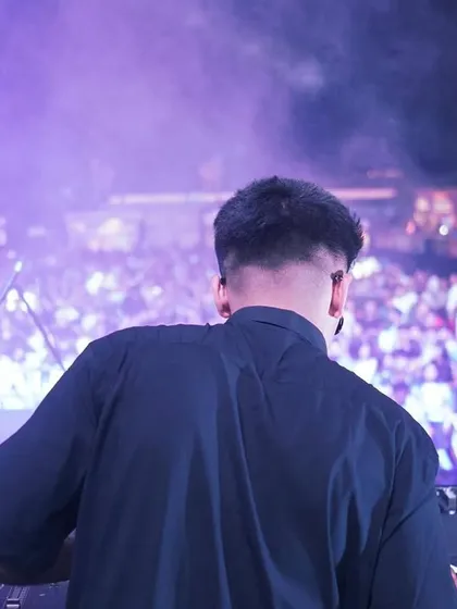A view from behind, looking out at the massive audience that came to see us perform in Rajkot.