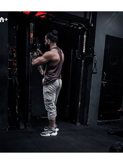 Everything I want, wants me more. A tricep pushdown on the cable machine, a crucial exercise for building the back of your arms.