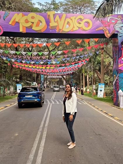 Standing at the entrance of Mood Indigo at IIT Bombay. I never thought I'd be here as a judge, especially considering my college grades. It's a testament to following your passion.