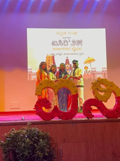On stage at St. Joseph’s University College, being felicitated during a Kannada cultural event. It's an honor to be recognized and to participate in events that celebrate our local talent and heritage in Namma Bengaluru 💫