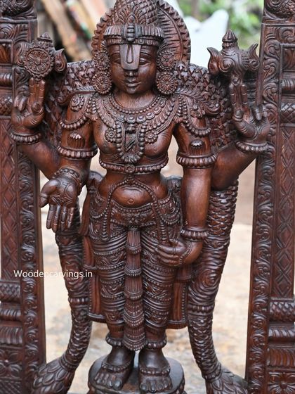 A close-up of the 48-inch sold Balaji statue, focusing on the upper body and the intricate carving of the jewelry.