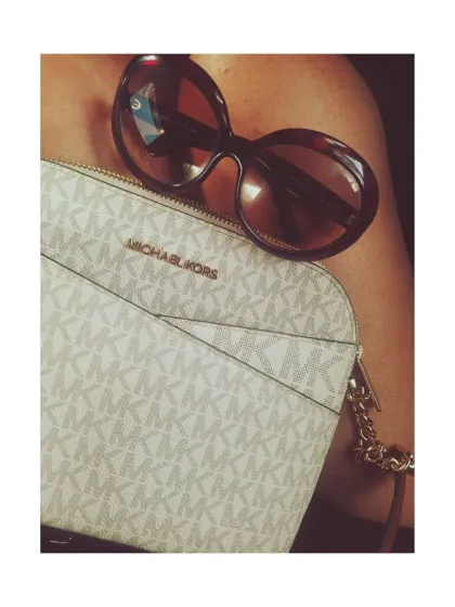 A classic combination of a Michael Kors bag and Fendi sunglasses. Investing in timeless designer accessories is always a good idea.