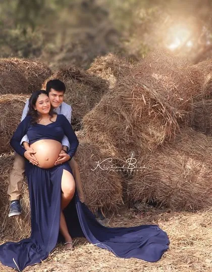 Finding the perfect light is everything in outdoor photography. This rustic, sun-kissed location provided a warm and romantic backdrop for this couple's maternity portraits.