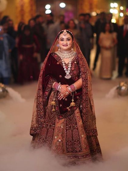 Walking on clouds. This grand entry with smoke effects makes my bride look like she's in a fairytale.