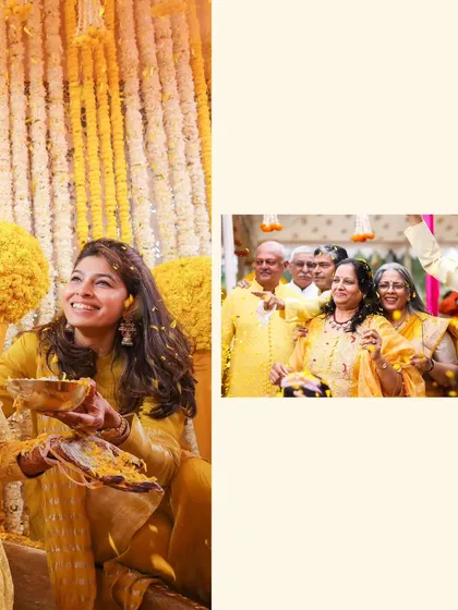 A beautiful shot of a guest showering the bride with flower petals against a backdrop of marigold strings.