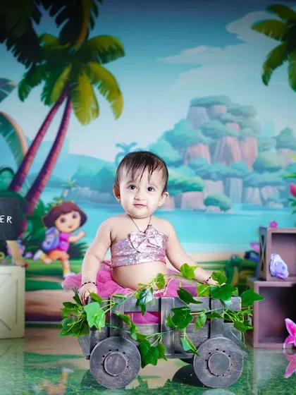 Another take on our jungle theme, this time with a Dora the Explorer vibe, featuring lush palm trees and tropical flowers.