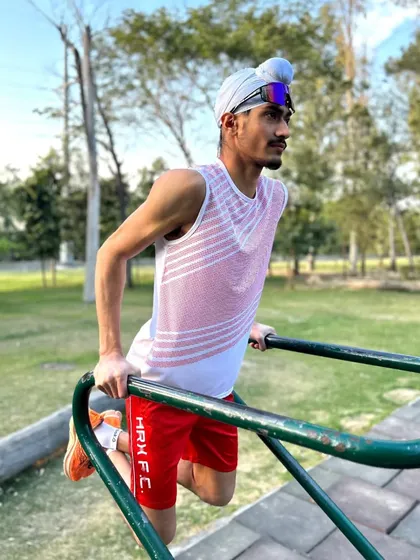 Working on tricep and chest strength with dips at an outdoor park. Using your environment for training keeps things fresh and challenging.