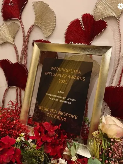 Honoured with the Gold award for Trendsetting Food Design by the WeddingSutra Influencer Awards 2025. This recognition, displayed amongst beautiful decor, affirms our passion for culinary innovation.