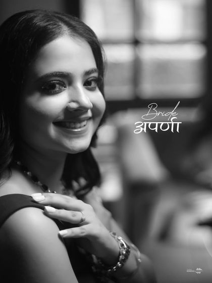 A classic black and white portrait of the bride, Aparna. Her happy, confident smile makes this a timeless and beautiful image.