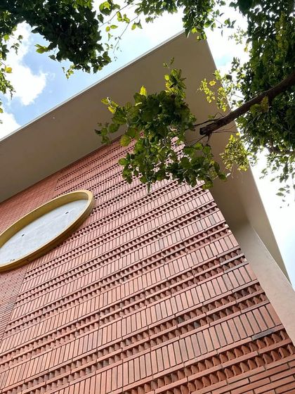 Close-up shots of the patterned brick facade. This level of detail is a hallmark of our work, showcasing the skill of our masons and our commitment to creating tactile, handcrafted building surfaces.