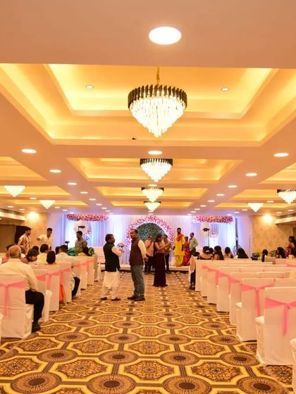 Another shot from a live event at Jashan banquet, showing guests seated and watching the ceremony. The hall's lighting and ambiance are perfect for celebrations.