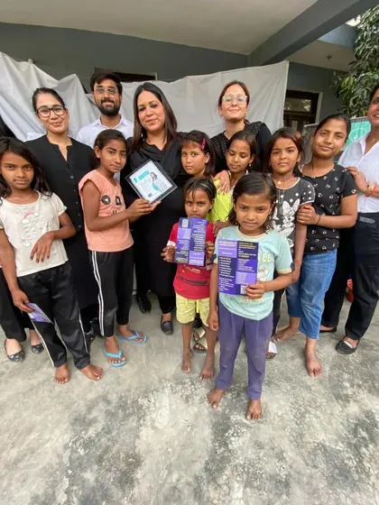 A group photo with my team and the bright young children at the workshop. We distributed informational materials to ensure the lessons on legal rights and personal safety stay with them.