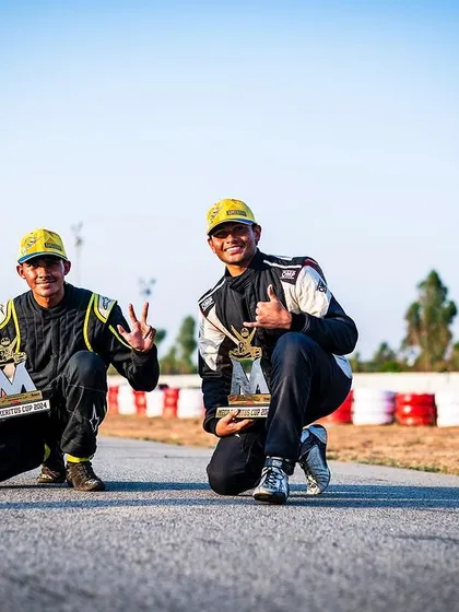 Two of our drivers celebrating a double podium finish at Round 2 of the Meco Meritus Cup. Their camaraderie and competitive spirit drive the entire team forward.