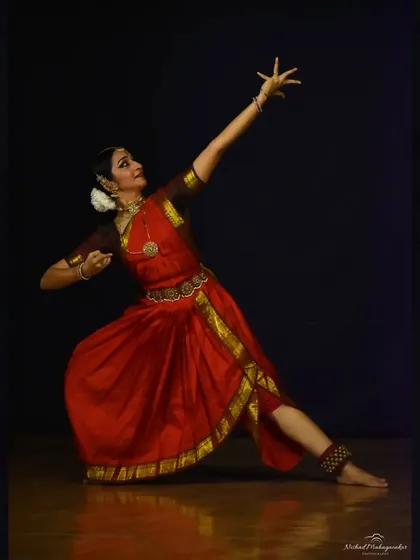 A powerful, angular pose that demonstrates the control and strength required in classical dance. This was from a particularly energetic piece in my solo repertoire.