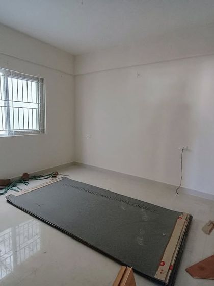 A blank canvas ready for transformation. This is a room at the Adithya Rica Apartments project before our work begins, showing the empty space we are about to turn into a beautiful home.
