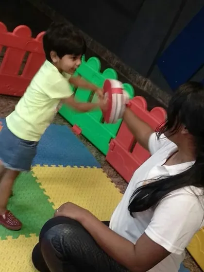 A young girl having fun while learning to punch. My goal is to make martial arts an enjoyable and empowering experience for children.